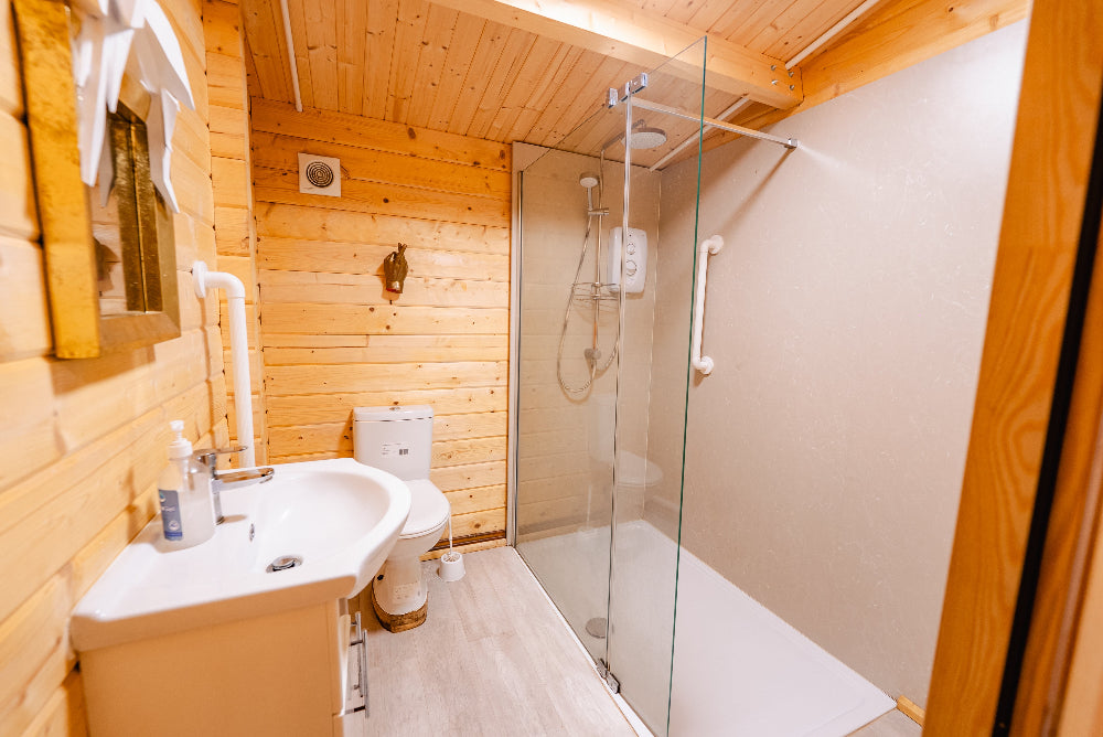 Powerful shower pine forest view glamping